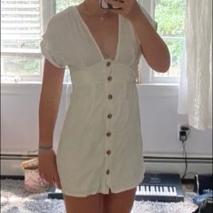 White mini dress with buttons